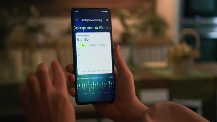 Monitoring the household solar energy system. Examining power production and consumption data in an energy-efficiency smartphone app. Fictional interface.