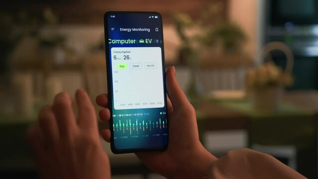 Monitoring the household solar energy system. Examining power production and consumption data in an energy-efficiency smartphone app. Fictional interface.