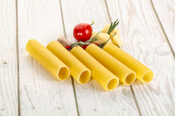 Raw uncooked Italian pasta Cannelloni