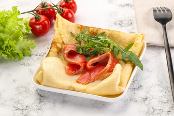 Russian pancake with salmon fish