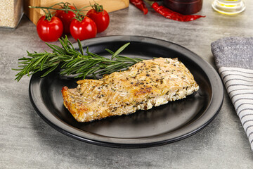 Baked salmon fish served rosemary