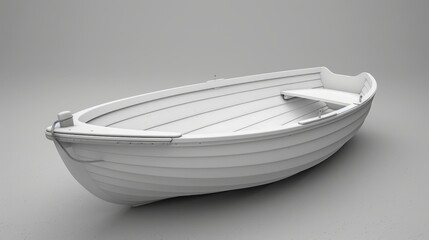   A tiny white boat atop a gray floor, adjacent to a black-and-white image of its bow