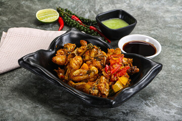 Vietnamese cuisine - fried frog with vegetables