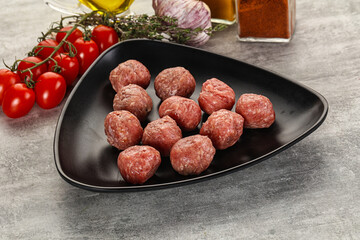 Uncooked raw beef meatball minced