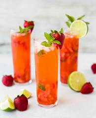 cocktail with strawberries and mint