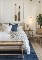 photo of the bedroom, with white walls and blue accent decor