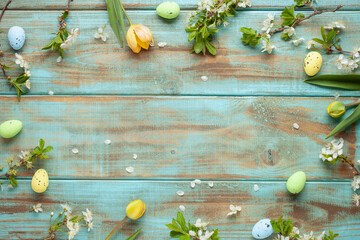 Easter background with   colored eggs and decorations on green background . Top view. Flat lay