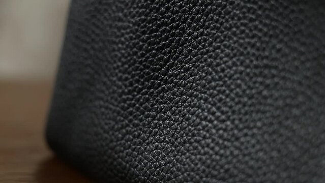 Black leather man bag for background, black leather