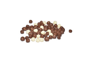 Corn balls with chocolate and vanilla flavors are scattered on a white background for a hearty breakfast.