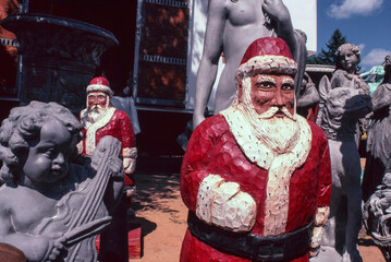 Santas and statuary for sale at the flea and antique market. Brimfield, MA