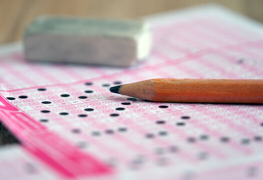 Multiple-choice test exam and marking the answers.