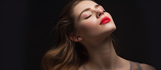 A woman wearing bold red lipstick