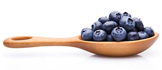 Wooden spoon with blueberries