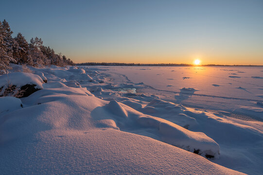 Sunset over the frozen sea. Finland