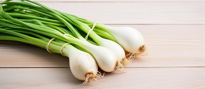 Green onions on rustic wooden table - Powered by Adobe