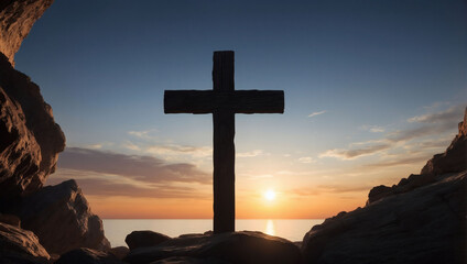 Silhouette of a wooden cross against the setting sun, viewed from a rocky cave entrance.