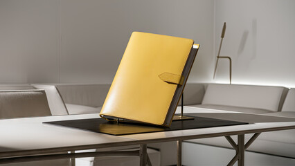  A stunning image of a pristine yellow leather folder elegantly positioned on a pristine white desk in a minimalist room.