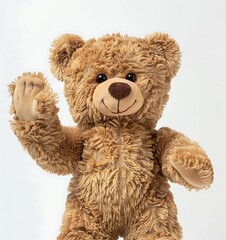 photo of adorable toy brown teddy bear waving isolated on a white background in a front view