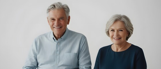 Obraz premium Smiling mature couple on white background