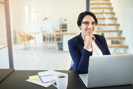 Portrait, laptop and woman in office, coffee and confidence for project, editor and corporate. Public relations, review and proofreading of articles, technology and online for company and notebook