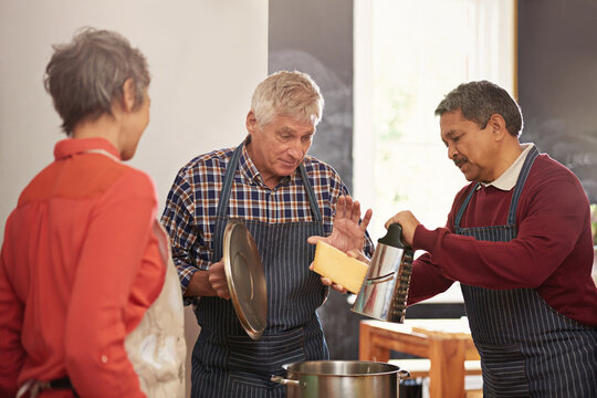 Cooking class, learning and mature people with chef in kitchen for help, guide or how to with cheese, advice or steps. Food, health and couple with private nutritionist for meal prep, teaching or fun - Powered by Adobe