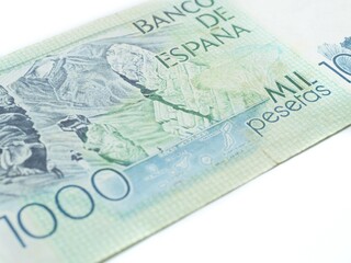 Fototapeta na wymiar A vintage 1000 mil pesetas banknote with the Teide volcano. Old spanish paper money