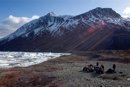 Alaskan ATV Riders in Glacial Wash