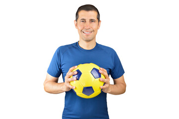 Man playing football holding soccer yellow ball over white background with a happy and cool smile on face. Lucky person.