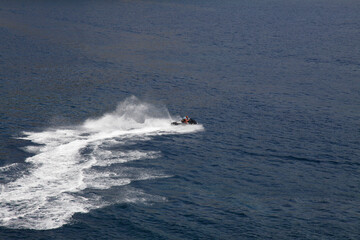 Naklejka premium jet skiing in a bay near Petrovac, Montenegro