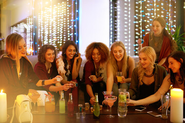 Party, nightclub and friends with alcohol shots for birthday celebration, ladies night and social event. Cheers, toast and women drinking to celebrate, happy hour and meet up for cocktail in pub