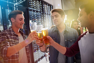 Men, beers and cheers with friends drinking at social event, restaurant or party with happiness....