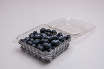 Delicious Ripe Blueberries in an Open Plastic Container