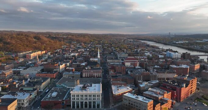 Troy, NY, USA - 04-21-2024: Late afternoon spring aerial hyper lapse video of Troy, NY.