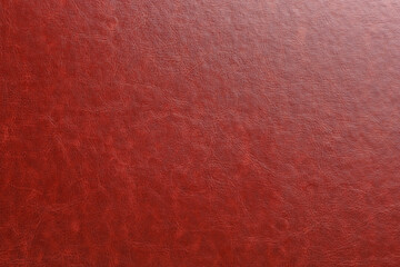 A red leather surface with a grainy texture