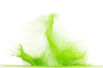 Small size green Sand flying explosion, vegetable sands grain wave explode. Abstract cloud fly. Green colored sand splash throwing in Air. White background Isolated high speed shutter, throwing freeze