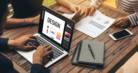 Graphic designer software for modern design of web page and commercial ads showing on the computer...