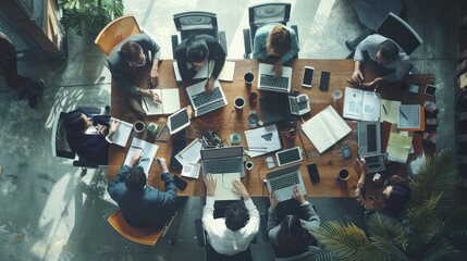 Top view angle of meeting atmosphere of office workers at meeting table with stationry report file.