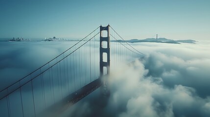 The Bridge, captured from above with misty waters below and clear skies overhead. The scene is a serene blend of iconic architecture and natural beauty