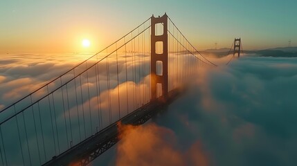 Fototapeta premium The Bridge, captured from above with misty waters below and clear skies overhead. The scene is a serene blend of iconic architecture and natural beauty