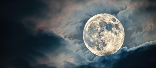 Beautiful view of the full moon in the sky at night