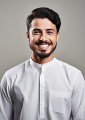 Middle eastern man in thawb smiling adult shirt.