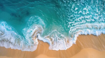 Aerial view of a sandy beach with clear blue water textures - obrazy, fototapety, plakaty