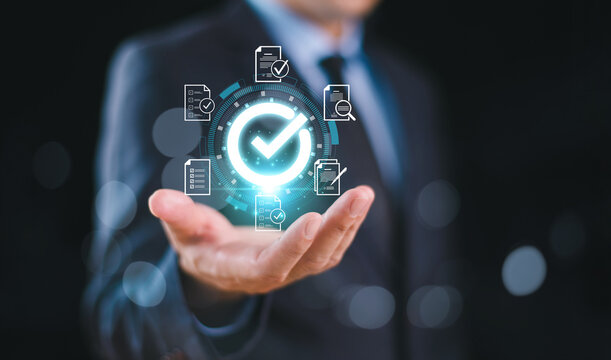 Document management system concept. Businessmen check&nbsp;electronic&nbsp;document on digital&nbsp;screen. Business performance evaluation checklist review, correct sign mark&nbsp;online approve paperless quality