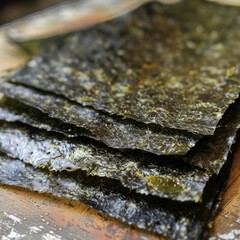 Sheets of crispy seaweed used in sushi preparation - obrazy, fototapety, plakaty