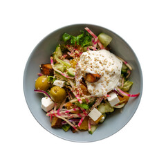 A bowl of fresh salad, topped with seeds, dressing and protein.