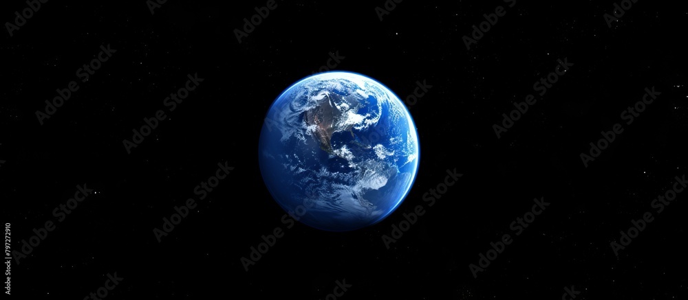 Wall mural the planet earth is seen from outer space, surrounded by a backdrop of shimmering stars