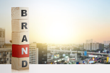 Stack of small wooden cubes with brand letters