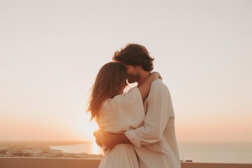 Fototapeta premium Celebrate their anniversary outdoors kissing hugging.