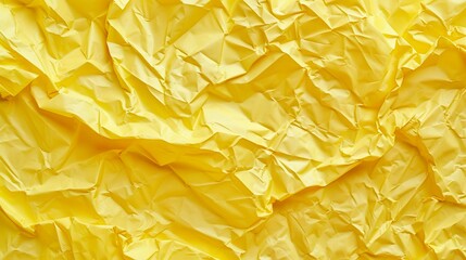 Crumpled paper background. Yellow crumpled paper texture.