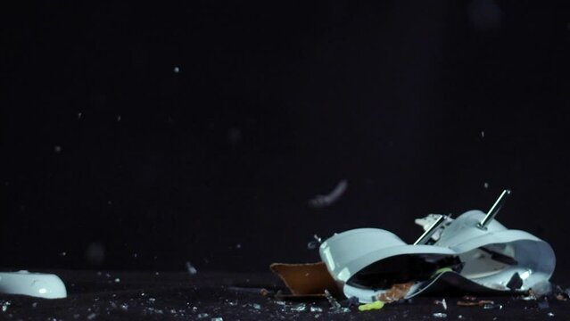 Vintage Alarm Clock destroyed in slow motion